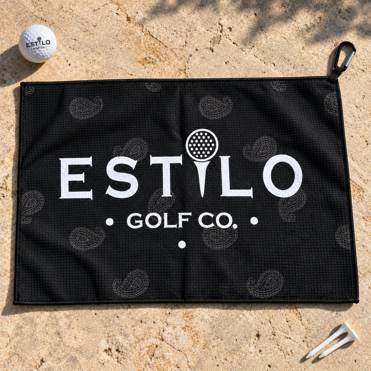 Dia de Golf waffle towel lifestyle shot with Estilo Golf Co. ball and tees