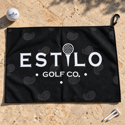 Dia de Golf waffle towel lifestyle shot with Estilo Golf Co. ball and tees