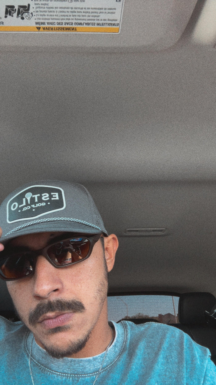 Gerald wearing the gray Logo Hat